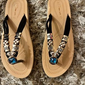 Beautiful Slip on sandals, black & gold Euro size 38 which is a US size 6.5